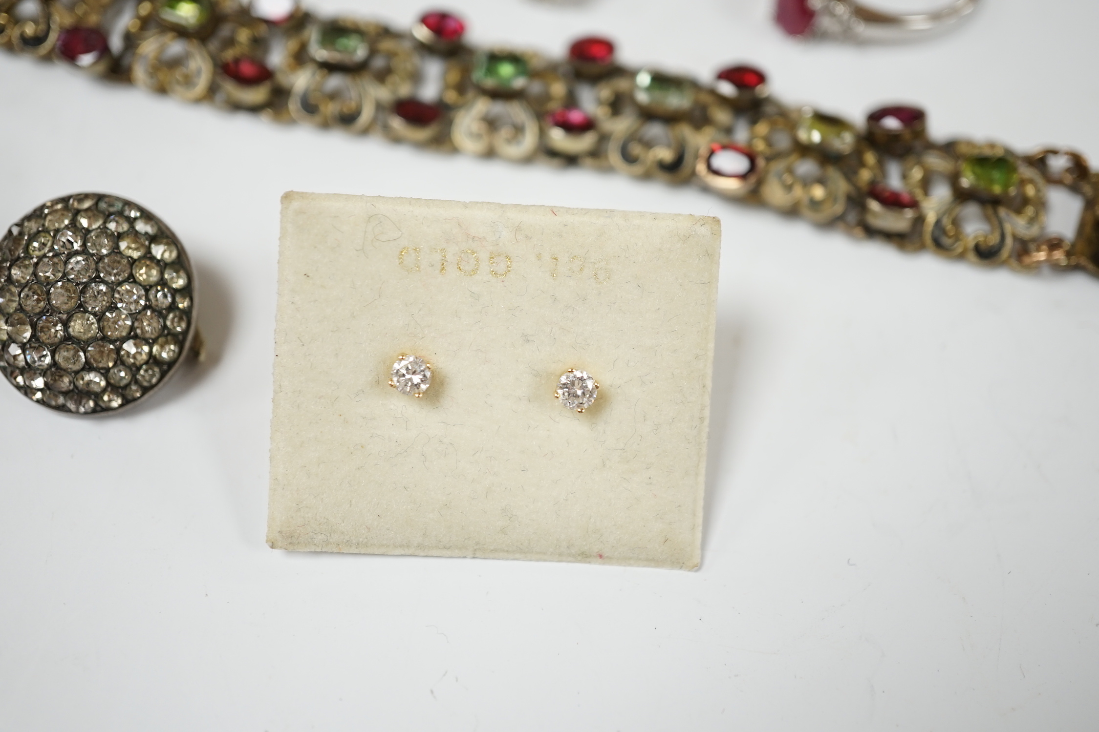 A small pair of diamond stud earrings, two 9ct white gold and gem set rings including diamond cluster and sundry other jewellery including An Austro-Hungarian style bracelet.